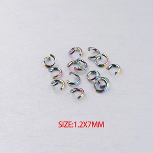 Macro view of 1.2x7mm rainbow stainless steel open jump rings for DIY jewelry