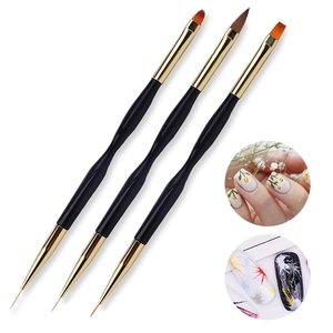 Detail of dual-ended black and gold nail art brushes with fine tip and round brush heads