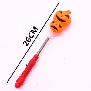Detail view of 26cm Halloween pumpkin glowing wand with spring and red handle
