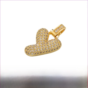 Macro detail of gold-plated brass heart pendant with pave cubic zirconia and measurements