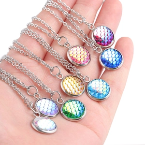 Polished 12mm round ocean scale necklaces set in vibrant multicolor gradient finishes