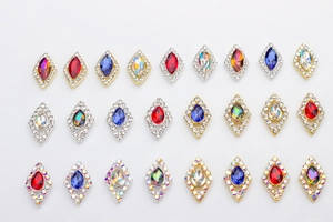 Macro view of assorted marquise alloy nail crystals with sparkling rhinestones in various colors