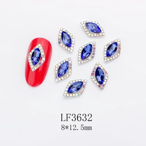 Detailed view of dark blue marquise nail art crystal with silver base and 8x12.5mm size