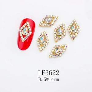 Macro detail of LF3622 rhomsus nail art charm with AB crystals and gold metal frame