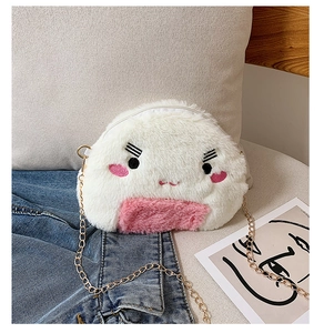 Detail of cute rice ball plush bag with pink blush embroidery and gold chain strap
