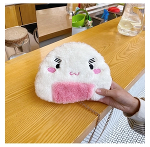 Detail of cute plush rice ball crossbody bag with soft texture and metal chain strap