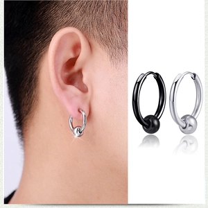 Detailed close-up of minimalist stainless steel hoop earrings with beads in silver and black