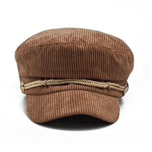 Classic dark brown corduroy newsboy cap with gold braided strap and metallic buttons