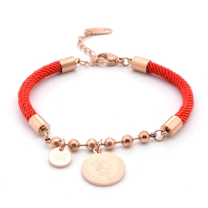 Red braided string bracelet with rose gold Elizabeth II coin and crown charms