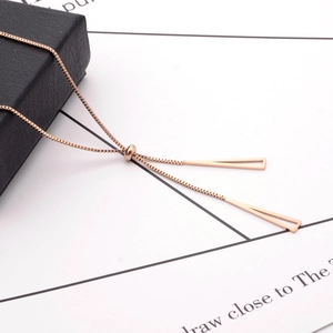 Rose gold triangle tassel slide necklace in titanium steel with adjustable pull chain