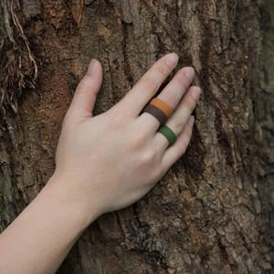 Three-piece silicone rings set for men with bark texture in orange brown and army green