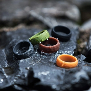 Macro view of textured outdoor silicone sports rings with waterproof bark pattern texture