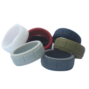 Close-up of multi-color silicone rings with checkered texture for sports and fitness
