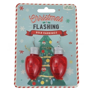 Detail of red Christmas flashing bulb earrings on festive Joy to the World packaging