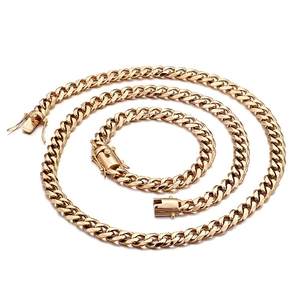 Golden hip hop cuban link chain set with necklace and bracelet featuring secure box clasp