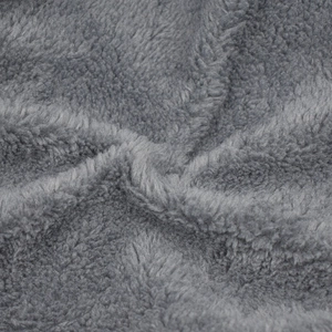 Close-up of thick grey thermal fleece lining for winter knitted hats and outdoor gear
