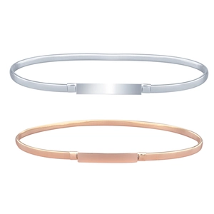 Elastic metal spring waist belts in silver and rose gold with sleek rectangular buckles