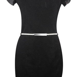 Detail of minimalist silver metal waist chain with sleek rectangular buckle on dress