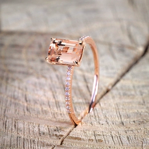 18K rose gold engagement ring set with rectangular pink stone and pavé zircons