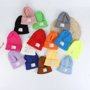 Colorful winter knit beanies for women and kids in 14 vibrant candy shades with logo patch