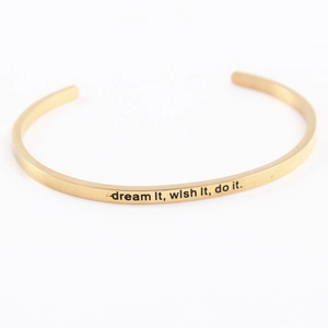 Golden stainless steel mantra bracelet with dream it, wish it, do it engraved quote