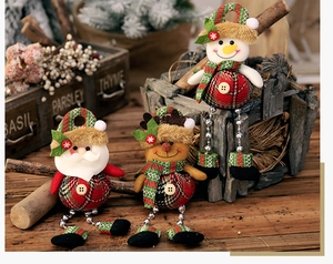 Detailed trio of plush Santa, Reindeer, and Snowman dolls with metal bead legs and plaid hats