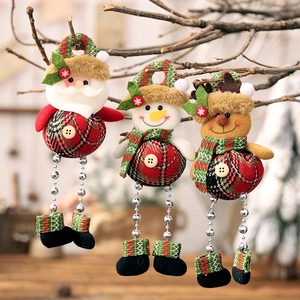 Plush Christmas ornaments featuring Santa, snowman, and reindeer with plaid details