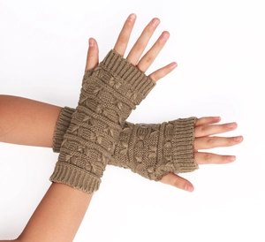 Close-up of thick knitted winter fingerless gloves with brown cable pattern and ribbed cuffs