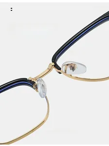 Detail of soft transparent silicone nose pads on business half-frame reading glasses