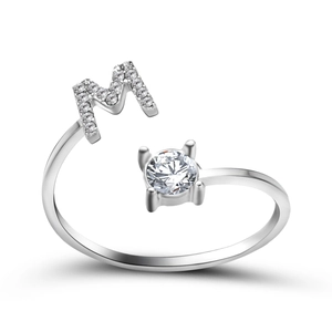 Adjustable silver ring with letter M sparkling zircons and round main stone detail
