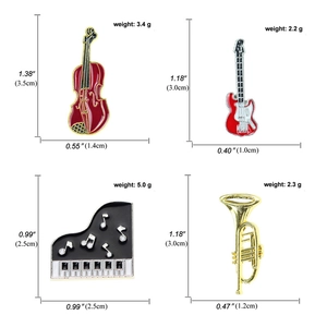 Enamel musical instrument brooch pins set featuring piano, guitar, and cello designs
