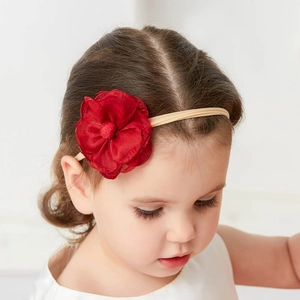 Infant headbands with large red fabric flower on beige elastic band for baby girls