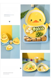 Detail of yellow duck divided plate set showing heat-resistant resin material and food sections