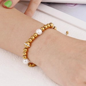 Adjustable golden bead bracelet with white pearls and sparkling diamond accents for women
