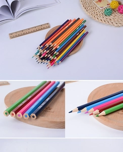 Detail view of hexagonal colored pencils with sharp tips and wood texture