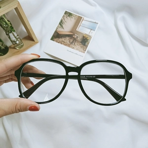 Close-up of black oversized frame glasses showing temple model Z3336 57-18-137 details