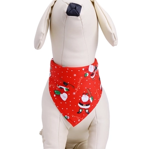 Detail of Christmas dog bandana with Santa Claus pattern and Merry Christmas text