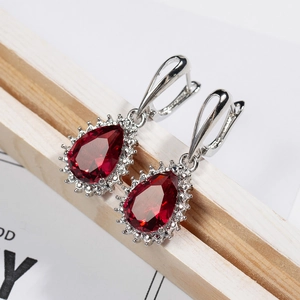 Elegant pear cut ruby zircon drop earrings with sparkling diamond halo in silver