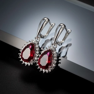 Elegant S925 silver lever-back earrings with pear-cut red zircon and halo diamond accents