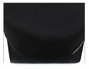 Close-up of reinforced stitching on the top of a black cotton military flat top cap