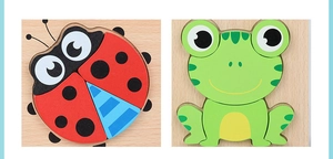 Detail view of wooden ladybug and frog puzzles for early childhood development
