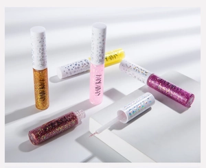 Macro shot of liquid glitter eyeliners in various colors with precision brush tip details