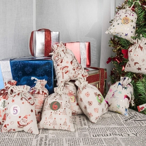 24-piece Christmas countdown burlap drawstring bags with festive patterns and numbers