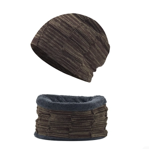 Detail showing the thick grey faux fur lining inside the knitted neck warmer for winter