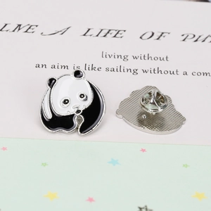 Detail showing the front and butterfly clutch back of a cute panda enamel lapel pin