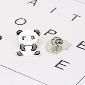 Detailed view of panda enamel pin with glossy finish and butterfly clutch backing
