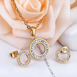 Sparkling gold stainless steel jewelry set with hollow circle crystal necklace and earrings