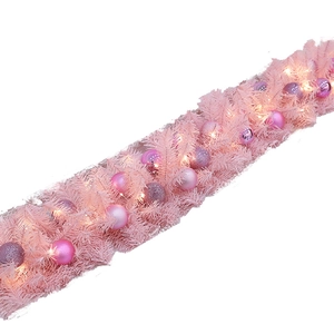 Pink Christmas garland with warm LED lights and colorful ornaments for shop decoration