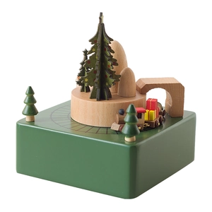 Carillon natalizio in legno con base verde, trenino rotante e alberi di Natale decorativi