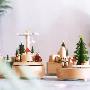 Rotating wooden Christmas music box with hand-painted Santa and reindeer holiday ornaments